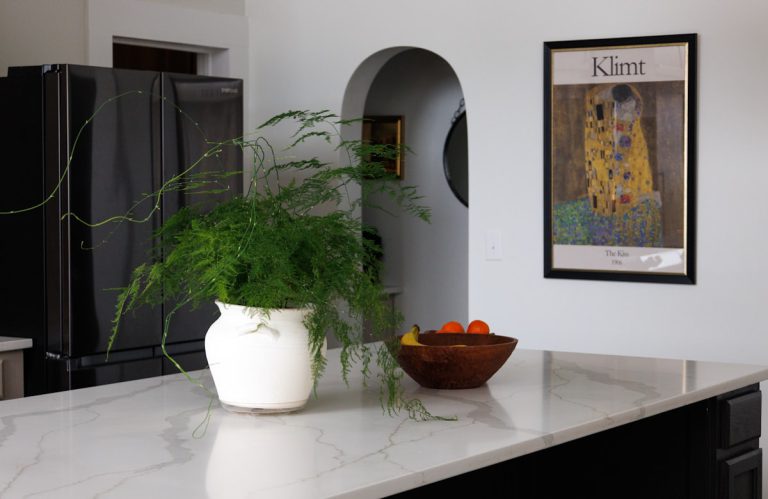 Welcome basket of snacks prepared on a benchtop for guests upon arrival